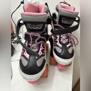 Light Up Roller Skates - Black and Pink adjustable to 4 different sizes. Medium.